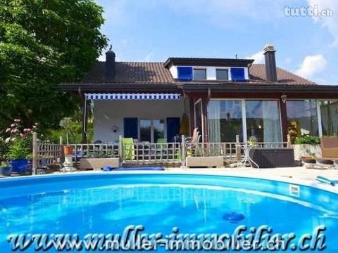 Spacieuse villa avec piscine à Corminboeuf